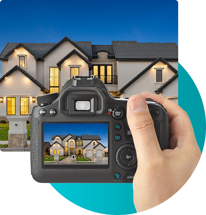 Close up of hands holding dslr camera and pointing to new construction home